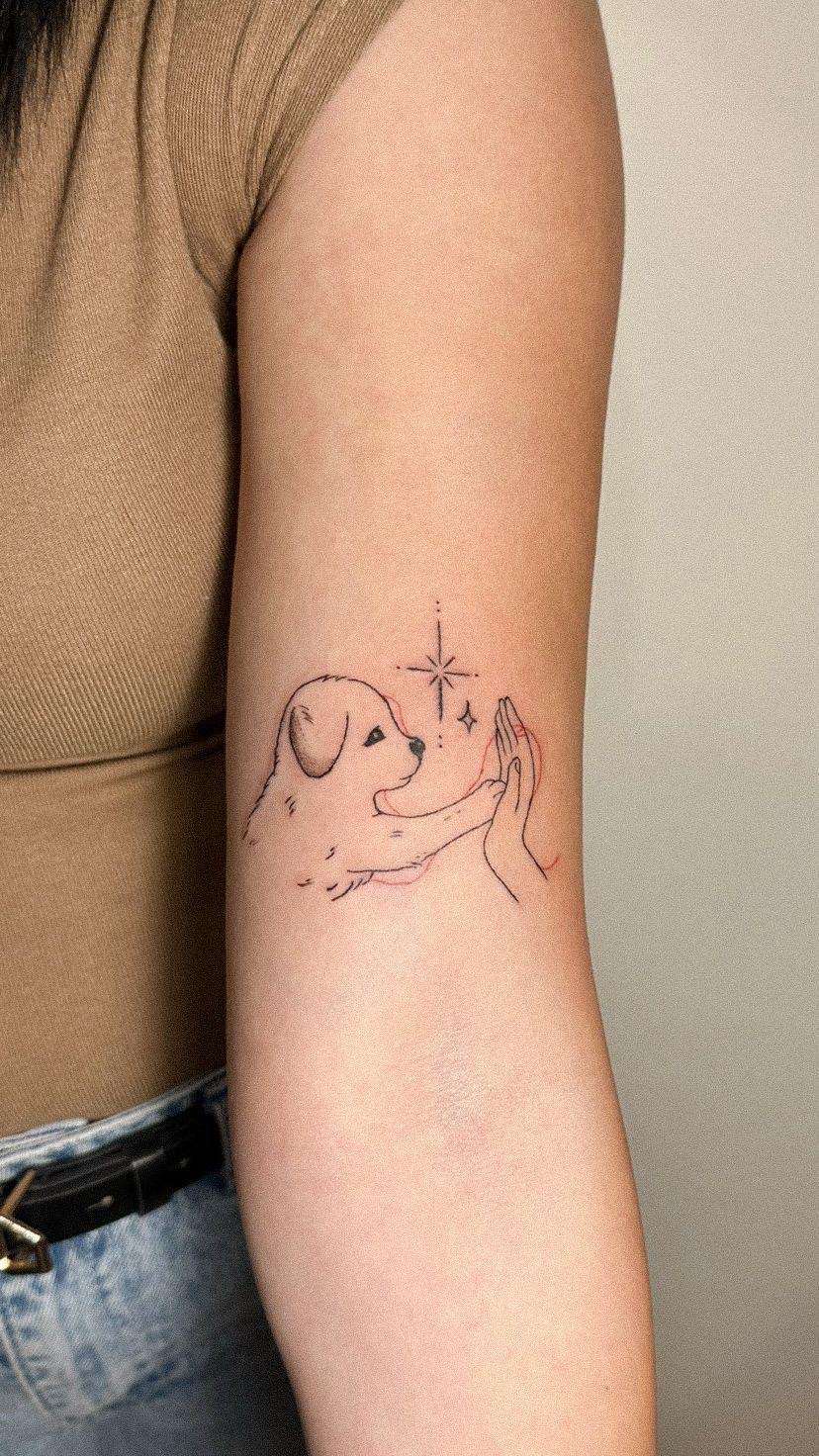 Moomins tattoo on forearm